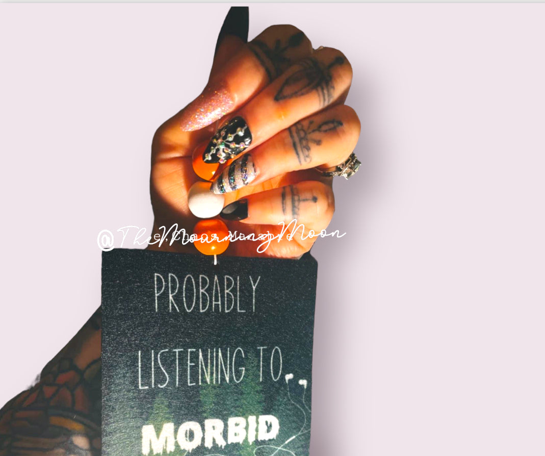 Probably listening to morbid air freshener