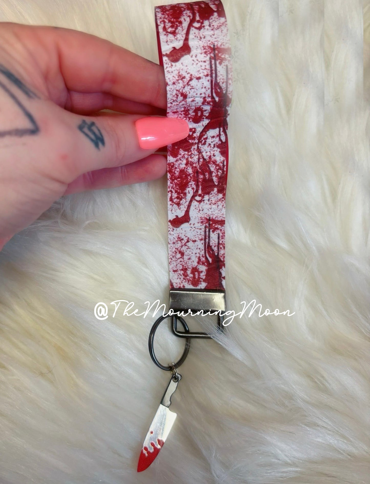 Blood splatter faux leather wristlet