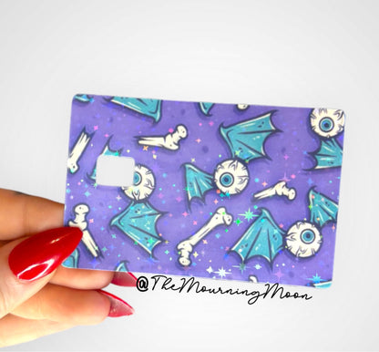 Winged eyeball credit card skin