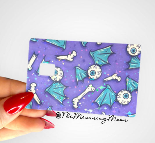 Winged eyeball credit card skin