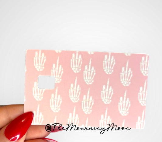 Pink skeleton finger credit card skin