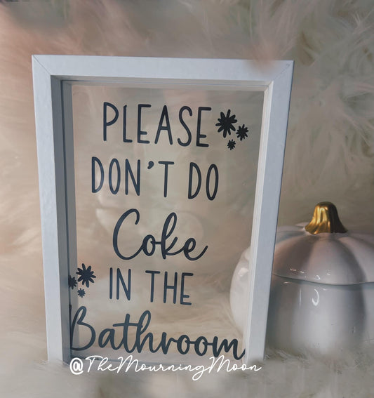Please don’t do coke in the bathroom sign