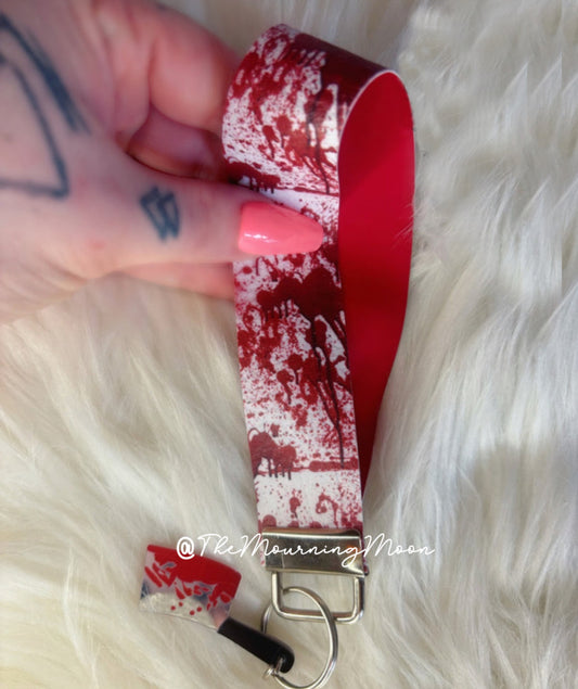 Blood splatter faux leather wristlet